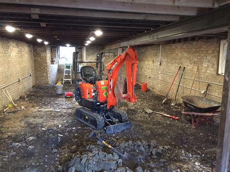 digging a hole with a mini excavator|digging basement with mini excavator.